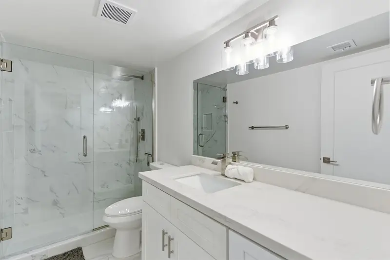 Second full bathroom at Hideaway with a single vanity and walk-in shower