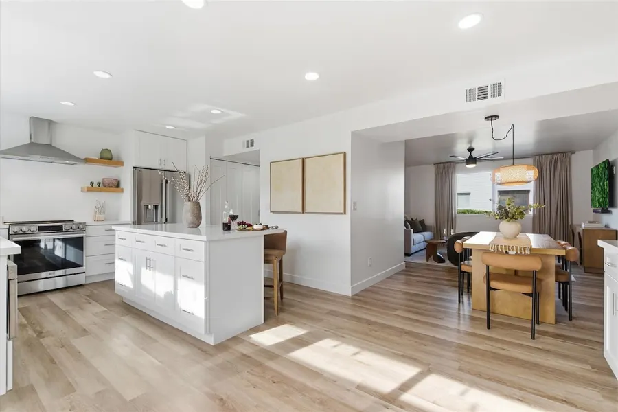 Kitchen island and shaker cabinets at Hideaway townhouse in Scottsdale